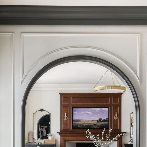 Park & Oak on Instagram: "You know how we love dark and moody, but sometimes you need a little brightness, especially in this entry. By adding white paint, moulding and a large arched opening to the living room, we added some much needed brightness to this mid-century home. #POglenellynrefresh GC: @pattersonpaintingremodeling" Arch Box Moulding, Arched Molding On Wall, Archway Moulding, Black Archway, Painted Archway, Restored Homes, Modern Victorian Farmhouse, Archway Molding, Round Doorway