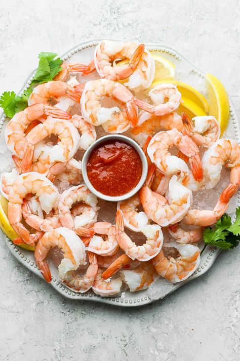 Classic Shrimp Cocktail - a delicious and easy shrimp cocktail recipe (with cocktail sauce recipe) - the perfect appetizer for any occasion! #shrimpcocktail #shrimpcocktailrecipe #shrimpcocktaildisplay #shrimpcocktailpresentation #shrimpcocktailsauce Shrimp Cocktail Presentation, Shrimp Cocktail Display, Shrimp Cocktail Recipe Easy, Cocktail Display, Easy Shrimp Cocktail, Cold Shrimp, Shrimp Cocktail Recipe, Shrimp Cocktail Sauce, Wooden Skillet