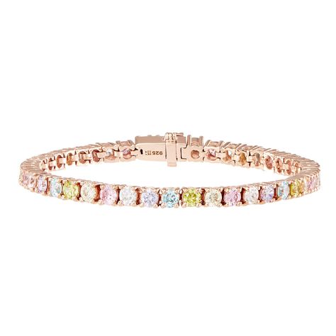 Add a hint of colour with our Tennis Bracelet. A simple but elegant design embellished in Pastel Rainbow Cubic Zirconia stones. 2.5 micron plated 18ct Rose Gold on Sterling Silver with a safety clasp fastening and available in 16cm (S/M) or 19cm (M/L). Complete your look with our Rose Gold Pastel Rainbow Tennis Necklace. To secure your bracelet:1- Slide the rod into the clasp until the t-bar is secure in the insert.2- Push up the latch until it clicks into place and sits flush with the clasp. To Rainbow Jewelry, Jewelry Website, Rainbow Bracelet, Jewelry Accessories Ideas, Stacked Jewelry, Tennis Necklace, Girly Jewelry, Dream Jewelry, Jewelry Inspo