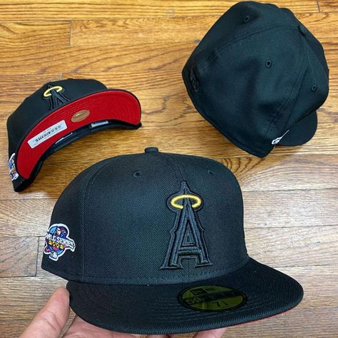 MOE SPORTS on Instagram: “🔥🔥🔥 Now available in store and www.moesportsnyc.com New Era Cap 5950 ANAHEIM ANGELS BLK/BLK RED BOTTOM 2002 WS-BLACK 7-8 available” Snap Back, Fitted Cap Aesthetic, Chris Brown Outfits, Swag Hats, Custom Fitted Hats, Mens Hats Baseball, Anaheim Angels, Hat Aesthetic, New Era Hats