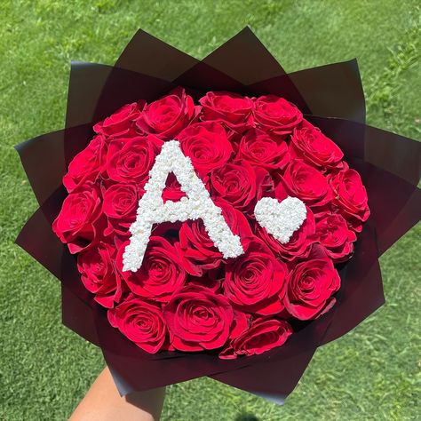 Initial bouquets are so cute! Dm to place your orders! @lilyyscreations 🤍🌹 Black Flowers Wallpaper, Quinceanera Planning, Luxury Flower Bouquets, Simple Flower Design, Christmas Bouquet, Flower Gift Ideas, Red Rose Bouquet, Beautiful Tiaras, Flowers Bouquet Gift