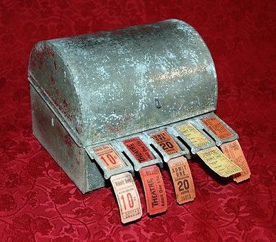 This is a 5-roll vintage ticket dispenser made by the Globe Ticket Company of Philadelphia, PA. The box is made of metal and weighs about 3 pounds. The outside of the box has corroded over the years Ticket Dispenser, Ticket Machine, Theater Ticket, Vintage Movie Theater, Ticket Booth, Vintage Ticket, Vintage Theatre, Master Board, Cinema Ticket