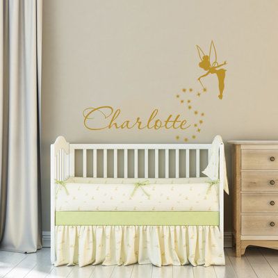 This perfect vinyl wall decal is a stunning addition to your little one's nursery room. It's always best to measure your space first. The decal will fit your space 100% then. Color: Gold, Customize: Yes | Decal House Tinkerbell Nursery Wall Decal Vinyl in Yellow, Size 22.0 H in | Wayfair | Home Decor Tinkerbell Nursery, Minnie Mouse Wall Decals, Disney Themed Nursery, Mermaid Wall Decals, Grandkids Room, Christian Nursery Decor, Gold Decal, Girls Wall Decor