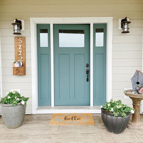 Mason Jar Studio on Instagram: “Did you catch our front door makeover on instastories? We’re in love with this custom teal/green that was made by mixing…” Teal Outdoor House Paint, White House Teal Door, Seafoam Front Door, Light Teal Front Door, Green House Blue Door, Turquoise Front Door Colors, Teal Doors Front Entrance, Teal Front Door, Teal Shutters