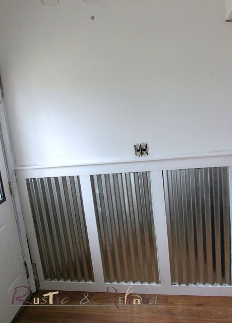 Using galvanized metal and pre-primed lumber for industrial wainscoting.. Modern Wainscoting, Entryway Diy, Wainscoting Staircase, Wainscoting Living Room, Wainscoting Height, Wainscoting Nursery, Picture Frame Wainscoting, Wainscoting Hallway, Black Wainscoting