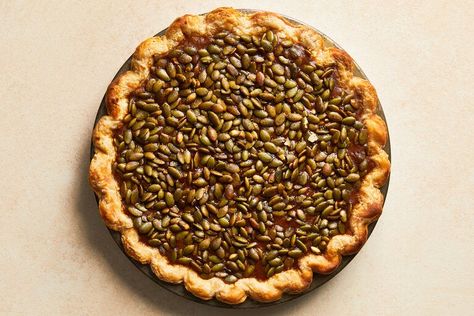 Pumpkin Pie With Pepitas Recipe - NYT Cooking Claire Saffitz Pumpkin Pie, Claire Saffitz Recipes, Pumpkin Seeds Baked, Claire Saffitz, Shelled Pumpkin Seeds, Thanksgiving Pie Recipes, Pies Recipes, Thanksgiving Pie, Thanksgiving 2024