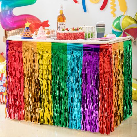 PRICES MAY VARY. 🌈【Wave Design】-- This newly designed rainbow table skirt features a unique wave shape that flows gracefully with the wind, adding a dynamic and lively touch to your rainbow party. Shiny and eye-catching, you will receive 2 packs of rainbow table skirts, each measuring 29x108 inches and made of metallic foil. 🌈【Six-Color Patchwork Design】-- We've used a one-piece print design with six colors (red, orange, yellow, green, blue, and purple) for Rainbow Party Decorations. This way, Rainbow Table Skirt, Fiesta Graduation Party, Fringe Streamers, Rainbow Birthday Decorations, Wavy Rainbow, Mardi Gras Party Decorations, Rainbow Table, Rainbow Party Decorations, Table Skirts