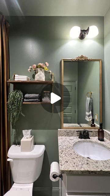 Alicia Fawn Treasure on Instagram: "Color drench bathroom makeover: THE REVEAL!!

After waiting, for what seemed like forever, my custom velvet curtain was delivered and I could finally finish up this bathroom!! The color drenched room and the dramatic long curtains make this bathroom feel so tall! It’s insane 🤯 

Stay tuned for another reel coming soon with all the details on how I installed this custom curtain and turned it into a shower curtain!

Comment “BATHROOM” for all the shopping links for this makeover! 

Paint color: dried thyme by Sherwin Williams - I did satin all over. 

#sherwinwilliams #sherwinwilliamspaint #bathroomdesign #diybathroom #colordrench #ceilingdesign #paint #diyhome #homeimprovement #custombathroom #custombathrooms #greenpaint" Water Room, Remodel Mobile Home, Peach Bathroom, Golden Moments, Coat Of Many Colors, Dried Thyme, Long Curtains, Custom Bathroom, Bathroom Inspo