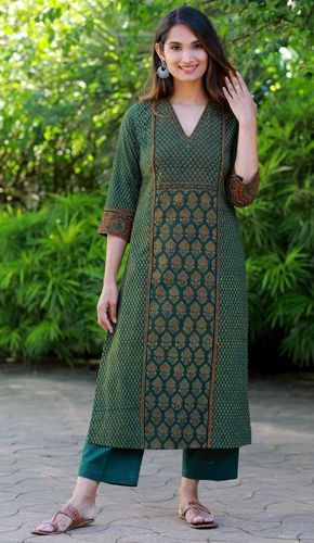 Elevate your style with this Forest Green Ajrakh Printed Kurta. Its tea-length design, V-shaped neck, and below-elbow-length sleeves make it a perfect blend of elegance and comfort, ideal for various occasions. Kurti Design Latest, Printed Kurti Designs, Cotton Dress Pattern, Silk Kurti Designs, Stylish Kurtis Design, New Kurti Designs, Ajrakh Prints, Green Colours, Simple Kurta Designs