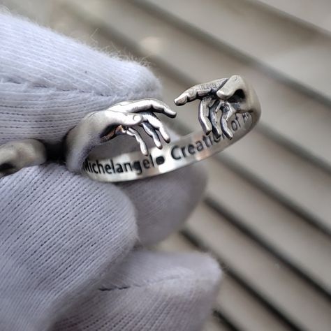 it made of Sterling Silver 925 k. The Creation of Adam Sterling Silver Ring discounted for a short time promotion. Ring inspired by Michelangelo's Creation of Adam in the Sistine Chapel, promotin ring, on sale ring, campain ring, discounted ring. 925 Silver Rings Men, Guy Rings, Cool Rings Aesthetic, David Ring, Angel Ring, The Creation Of Adam, Mens Silver Jewelry, Sistine Chapel, Men Stylish Dress