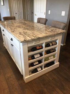 Wine Storage Island, Side Of Island Storage, Wine Rack On Island, Kitchen Island Ideas With Wine Rack, Wine Storage In Kitchen Cabinets, Wine Storage In Island, Wine Cubby In Kitchen, Island With Wine Storage, Built In Wine Rack Kitchen