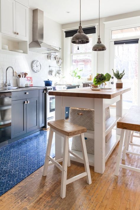 "The island gives additional counter space and is a casual spot for the family to share a meal." While the high bench provides ample seating, "having the family room right off the kitchen now allows everyone to hang out close to one another during meal preparation—without having too many cooks in the kitchen."  See more Kitchen Island Breakfast Bar Ideas & Inspiration | Apartment Therapy Breakfast Bar Small Kitchen, Breakfast Bar Kitchen Island, Kitchen Island Bench, Custom Kitchen Island, Small Apartment Kitchen, Small Kitchen Island, Kitchen Island Bar, Breakfast Bar Kitchen, Kitchen Island Design