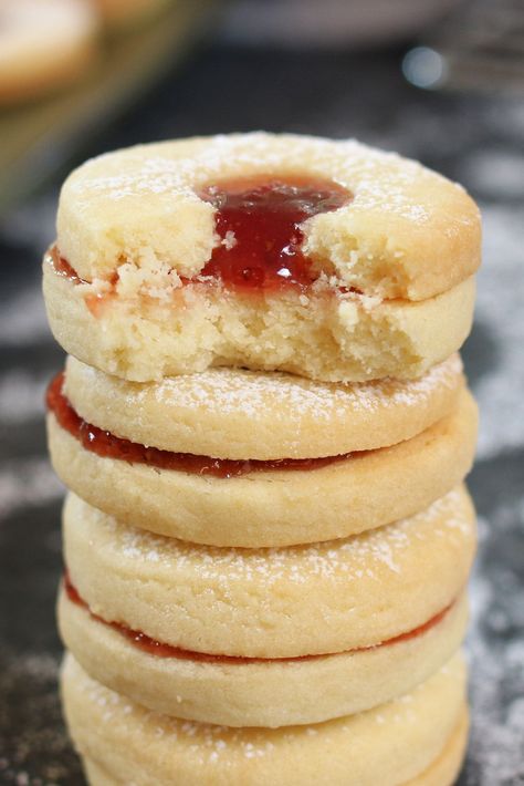 Bite out of a Jammie Dodger cookie, showing the soft and chewy texture. Victorian Desserts, Jammie Dodgers, Biscuit Sandwiches, Strawberry Sweets, Brownies Recipes, Biscuit Sandwich, Shortbread Biscuits, Biscuit Recipes, Buttery Biscuits