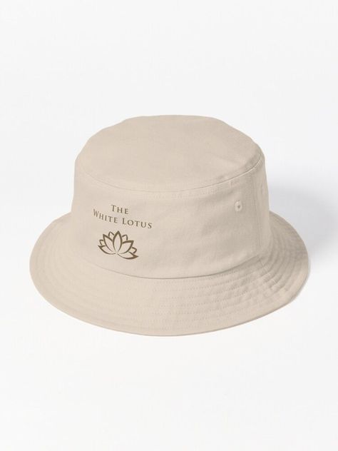 This one is in honor of one of HBO's iconic series The White Lotus. This can also be a perfect gifting item. Check out the link to avail this design on other incredible products! Flower Bucket Hat, Beach Bucket Hat, The White Lotus, Bucket Hat White, Bucket Hat Design, Black Bucket Hat, Friendship Symbols, Black Bucket, White Lotus