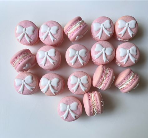 Light pink shells with white bows. I love classic themes 🎀 Vanilla, strawberry, and salted caramel macarons decorated with royal icing . . . . #macarons #macaron #frenchmacarons #dessert #desserts #fyp Light Pink Macarons, Salted Caramel Macarons, 1st Birthday Foods, Caramel Macarons, Coquette Birthday, Pink Shells, Pink Macarons, Pink Macaroons, Party Sleepover