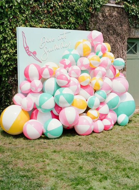 This pastel themed summer pool party was elevated by a variety of eclectic details, starting with a blue backdrop filled and adorable pool floaties! Bright Pool Party, Bright Summer Party, Cabana Party Ideas, Beach Club Party Theme, Florida Themed Party, Beach Party Ideas For Adults, Summer Party Themes For Adults, Beach Bash Party, Vintage Pool Party