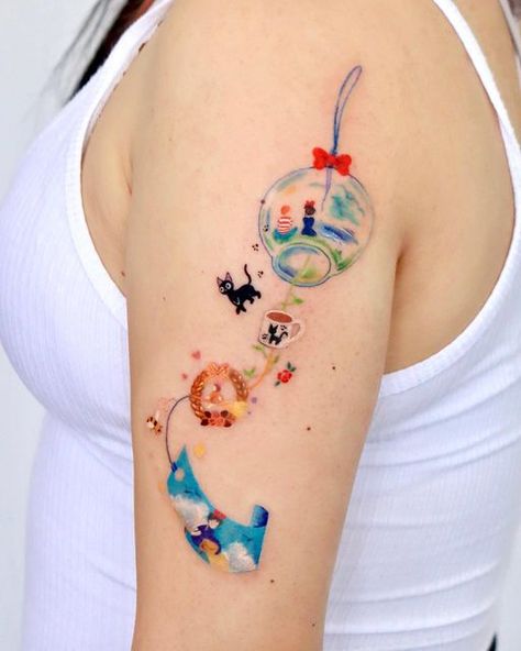 OVENLEE 🍃 ChaeheeLee on Instagram: "Kiki's delivery service Wind chime 🤍 A wind chime with all the cute elements from the movie. (Fyi, the photo was taken while the skin was still swollen!) ⠀ ⠀ ⠀ ⠀ ⠀ ⠀ #kikisdeliveryservice #ghiblitattoo #windchime #windchimetattoo #movietattoo #ghiblimovies #armtattoo #losangelestattooartist" Japanese Windchime Tattoo, Japanese Wind Chimes Tattoo, Ae Tattoos, Windchime Tattoo, Wind Chime Tattoo, Kiki's Delivery Service Tattoo, Ghibli Tattoos, Wind Tattoo, Wind Charm