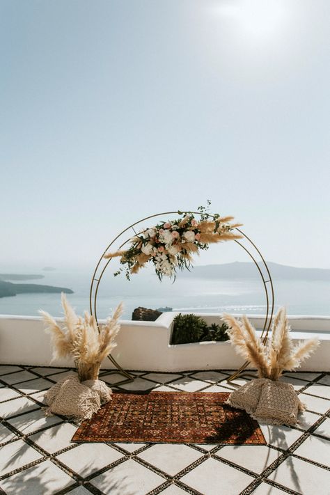 Dried floral ceremony decor | Image by Lighthouse Photography Mediterranean Boho, Santorini Wedding Venue, Santorini Elopement, Floral Ceremony, Lighthouse Photography, Cheap Beach Decor, Summer Wedding Ceremony, Global Wedding, Lighthouses Photography