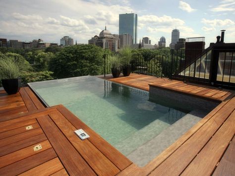 Built for fun and relaxation, these incredible pools and decks take outdoor entertaining to the next level. Take a break and browse through these impeccably designed backyard retreats. Wood Pool Deck, Bio Pool, Amazing Swimming Pools, Boston Public Garden, Infinity Edge Pool, Cool Roof, Rooftop Deck, Rooftop Pool, Roof Deck