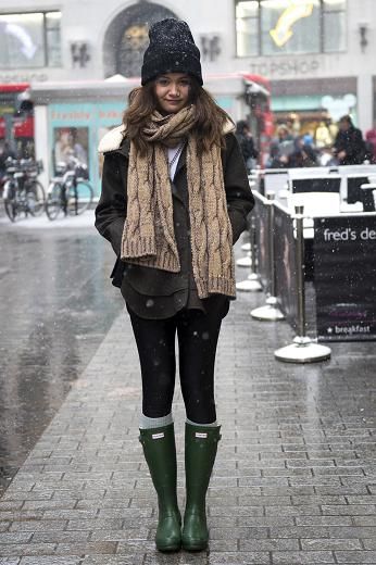 London v Paris in the snow  LONDON: Lena Wellenhofer, 20, student. Hat, ASOS; scarf, Kenzo; coat, The Kooples; boots, Hunter Winter Fashion College, London Fits, Snow Outfits, Winter Outfits Snow, Trendy Winter Fashion, Winter Mood, Comfy Winter, Green Boots, Cold Weather Outfits