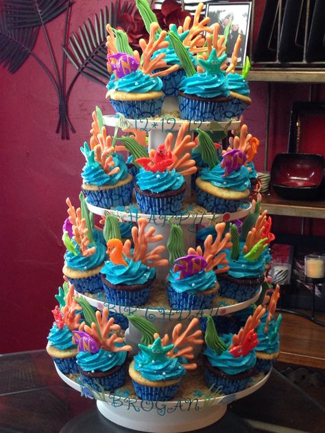 Kamp Koral Birthday Party, Under The Sea Cake And Cupcakes, Cupcake Under The Sea Theme, Under The Sea Party Desserts, Ocean Theme Candy Table, Ocean Animal Party Ideas, Under The Sea Birthday Party Cupcakes, Undersea Cupcakes, Under The Sea Sweets