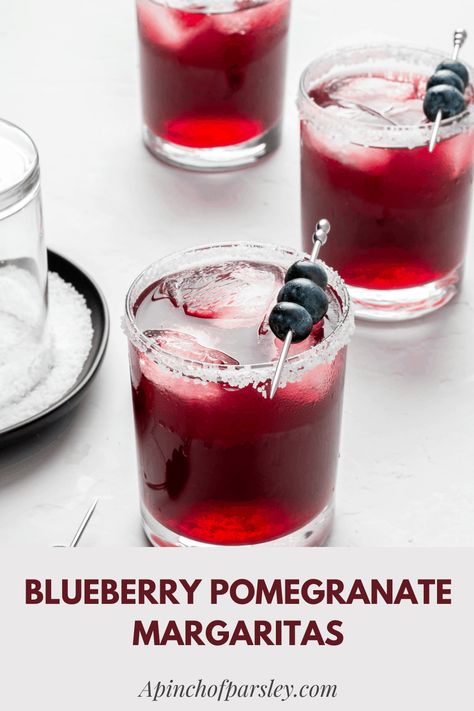 Refreshing, flavorful, and easily made at home, this blueberry pomegranate margarita is the perfect cocktail for any occasion. Whether you serve this as it is, frozen, or skinny, you're going to want more than one, trust me. Jackfruit Lettuce Wraps, Gluten Free Cocktails, Blueberry Simple Syrup, Blueberry Margarita, Pomegranate Cocktails, Blueberry Pomegranate, Pomegranate Margarita, Homemade Margaritas, Traditional Margarita