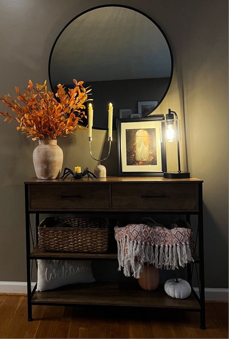 Halloween entry table decor Console table decor, Halloween decor, Halloween shelves, home decor, fall decor Follow my shop @courtneymcansh on the @shop.LTK app to shop this post and get my exclusive app-only content! #liketkit #LTKHalloween #LTKSeasonal #LTKhome @shop.ltk https://liketk.it/4k9nw Halloween Decor Console Table, Halloween Entry Table Decor, Halloween Shelves, Halloween Entry Table, Decor Console Table, Table Decor Halloween, Console Table Decor, Fall Windows, Entry Table Decor