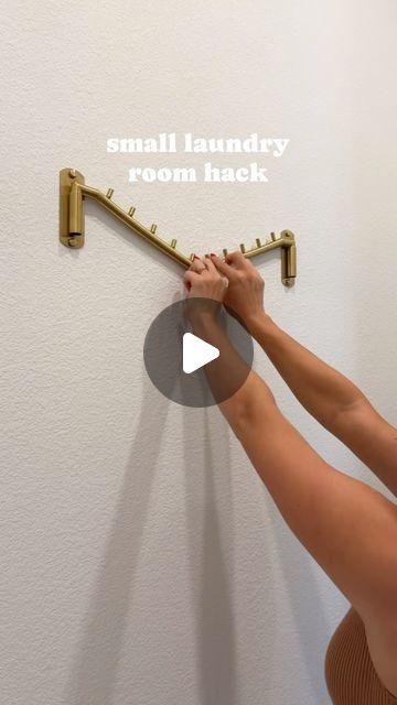 Brooke - Amazon finds . home . organization on Instagram: "Comment “laundry” and I’ll send you the link.   We have a smaller laundry room, so this has been the perfect hack for hang drying clothes. When you’re not using it, just push it again the wall!   #laundryroom #laundryorganization #laundryhacks #laundryroomdecor" Hanging Solutions For Laundry Room, Hang Clothes In Laundry Room, Laundry Hallway Ideas, Laundry Hanging Ideas, Laundry Room Clothes Hanging Ideas, Laundry Room Must Haves, Diy Laundry Room Ideas, Laundry Room Hacks, Laundry Room Diy