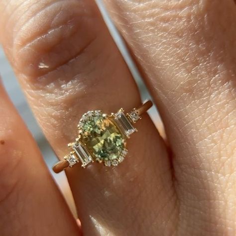 Brianna Trudell on Instagram: "One of my recent favorites- The Sura 1.2 CT Green Sapphire Ring✨ Swipe for video—she’s stunnnnnning! #ringsofinstagram #weddingrings #uniqueengagementring #gemstoneengagementring #sapphire #lavendercreekgems #oneofakind" Wedding Ring Different Stones, Saphire Engagement Ring Green, Elegant Engagement Rings Green, Vintage Color Engagement Rings, Unique Colorful Engagement Rings, Diamond And Green Engagement Ring, Graduation Ring Ideas, Sapphire Green Engagement Ring, The Sura Engagement Ring