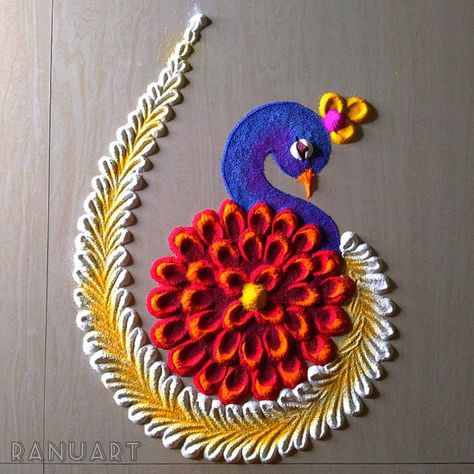 Visit YouTube channel RanuArt for video Peacock Small Rangoli, Small Rangoli Ideas For Diwali, Rangoli Designs Of Ganesha, Rangoli Best Designs, Rangoli Designs Ideas Diwali, How To Make Rangoli Design, Rangoli Designs Videos Diwali, Small Peacock Rangoli, Peacock Rangoli Easy