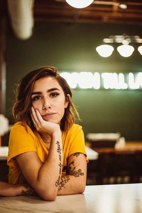 woman wearing yellow crew-neck shirt sitting beside table posing for photo Latest Background, Anatomy Poses, Background Wallpapers, Sitting Poses, Pic Pose, Instagram Ideas Photography, Portrait Photography Poses, Human Poses Reference, Figure Poses