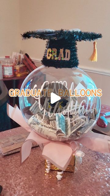 Shante Johnson on Instagram: "Some of Last Year's Graduate Balloons!!😊 These were a big hit Last year!! 🤗   Now Taking PreOrders!!🤗 Don't miss out!! 😝 Slots will fill up fast!!😳 Dm for Order inquiries 📩  #Moneyballon #graduationgifts #giftsforher #giftsforhim #gradgifts #reels #nolacreationstation #diy #crafter #explore #viral" Money Balloon Ideas, Balloon Money Gift Ideas, Grad Balloons, Money Balloon, Graduation Money Gifts, Graduation Money, Money Gifts, Creative Money Gifts, Clear Balloons