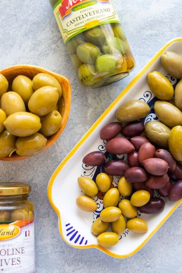 Here Are The Best Olives For Your Cheese Board – Giadzy Olives For Charcuterie, Olive Bar, Giada Recipes, Marinated Mushrooms, Italian Meats, Gorgonzola Cheese, Greek Olives, Charcuterie Cheese, Feed A Crowd