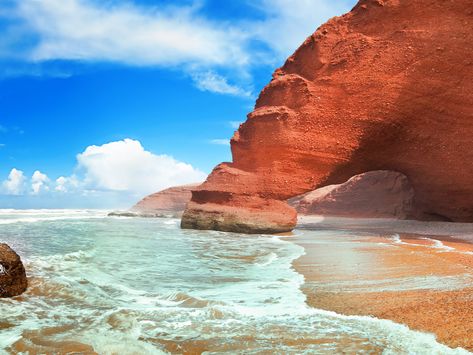 One of the best 30 beaches in the world Legzira Beach, known for it's Rock Arches. Learn more about Sidi Ifni #Sidi Ifni #Legzira #Morocco Morocco Beach, October Weather, Agadir Morocco, Travel Morocco, Desert Sahara, Morocco Marrakech, Daily Sun, Morocco Travel, Walled City