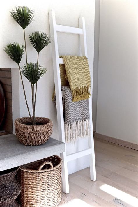 8 Unique Ways to Decorate with a Ladder Lovesac Sactionals, Bathroom Ladder, Wood Quilt, Quilt Ladder, Diy Blanket Ladder, Blanket Ladder, Neutral Living Room, Towel Hanger, White Blanket