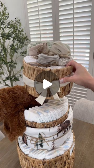 Kellie Atkinson | Baby shower gift basket 🐻🍼🧺 #babyshowergift #giftbasket #babyboy #babyshowergiftideas #baby | Instagram Diaper Cake Baskets, Blanket Cake Shower Gifts, Diaper Ideas For Gift, Dino Diaper Cake, Diaper Party Gift Ideas, Baby Tub Gift, Baby Shower Gift Packing Ideas, Diy Baby Basket Gift Ideas, Diaper Basket Gift