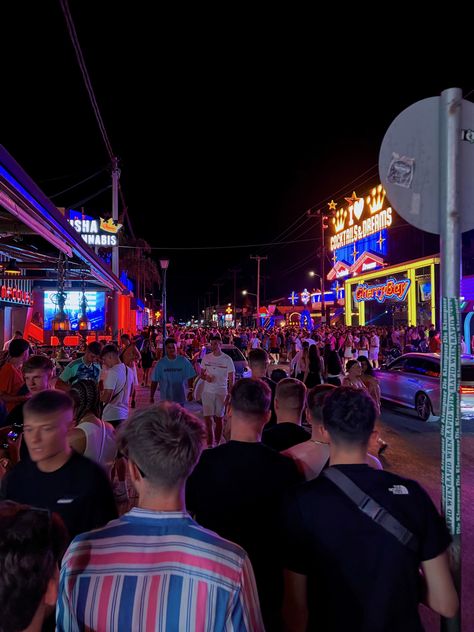 greece, zante, nightlife, partying & clubbing, neon lights, crowded street Laganas Zakynthos Night, Zante Clubbing, Clubbing In Greece, Benidorm Nightlife, Zante Aesthetic, Ayia Napa Nightlife, Zante Nightlife, Greece Clubbing, Zante Girls Holiday