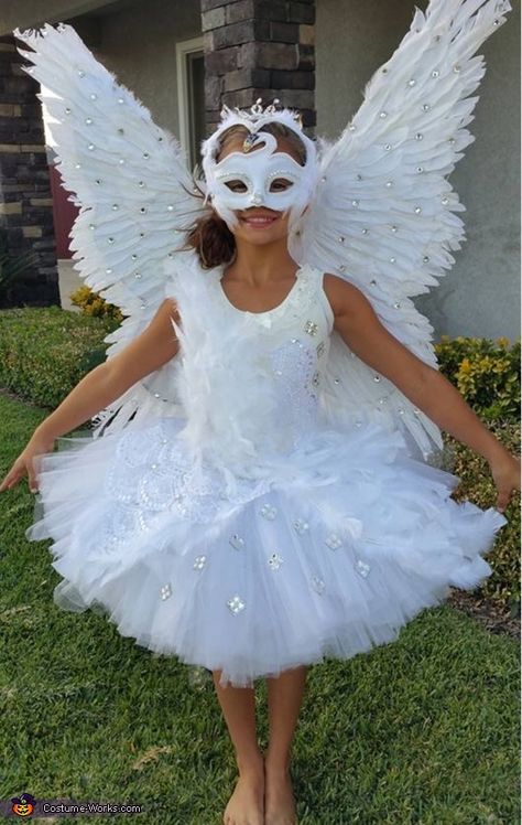 Ashley: This is my daughter Zia, she is wearing a Swan costume created by me. I bought the wings, leotard, and mask on Amazon, and added rhinestones, lace, lights and feathers... Swan Lake Costumes, Swan Costume, Princess Costume Kids, Halloween Costumes 2016, Homemade Costume, Costume Works, Angel Costume, Animal Costumes, Halloween Costume Contest