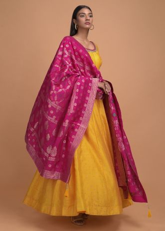 Yellow And Pink Anarkali Dress, Pink Banarasi Dupatta, Dresses For Haldi Ceremony, Pink Gharara, Yellow Anarkali Suits, Pink Anarkali Suits, Yellow Anarkali, Wedding Salwar Kameez, Silk Anarkali Suits