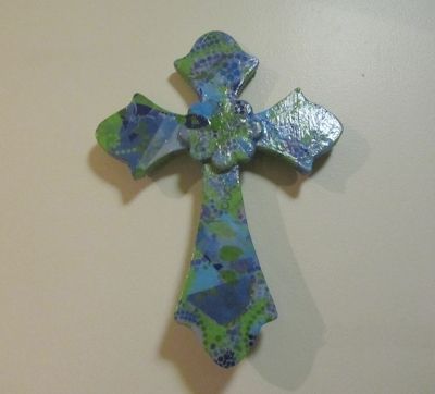 If you like to decoupage, you will like making this cross. I started with a plain wood cross purchased at Michael's. Wooden Cross Crafts, Way Of The Cross, Wooden Crosses, Sign Of The Cross, Old Rugged Cross, Cross Crafts, Cross Wall, Cross Art, Wood Cross