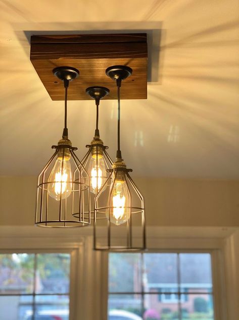 Triple Pendant Farmhouse light - Rustic Entryway - Edison Lightbulbs Included… | Farmhouse light fixtures, Farmhouse kitchen light fixtures, Rustic kitchen lighting Country Kitchen Light Fixtures, Entryway Light Fixture Ideas, Farmhouse Entry Light Fixtures, Black Farmhouse Light Fixtures, Rustic Light Fixtures Kitchen, Pendant Light Over Sink, Farmhouse Kitchen Lights, Rustic Office Design, Rustic Pendant Lighting Kitchen