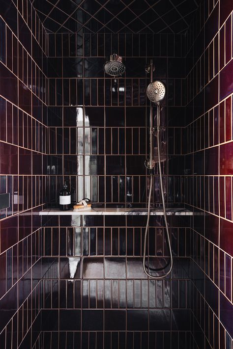 Primary bathroom/master bathroom shower designed in dark and moody aesthetic. Burgundy gloss shower tile with brass shower fixtures and marble stone shower shelf. Jean Stoffer Woodward, Established Home Jean Stoffer, Stoffer Home Bathroom, Primary Bathroom Ideas 2023, Jean Stoffer Bathroom, Speakeasy Bathroom, Spa Like Shower, Colour Bathroom, Small Dark Bathroom