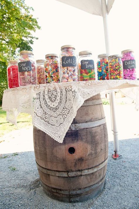 Wedding candy buffet rustic presentation.  See more wedding candy favors and party ideas at www.one-stop-party-ideas.com Diy Whiskey Barrel, Diy Candy Buffet, Diy Whiskey, Whiskey Barrel Wedding, Burlap Wedding Invitations, Barrel Wedding, Candy Buffet Wedding, Candy Bar Wedding, Deco Champetre