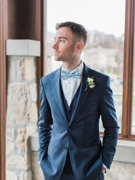 groom in navy blue suite and soft blue bow tie Blue Suit With Bow Tie Wedding, Groom Suit Bow Tie, Blue Suit Bow Tie, Teal Bow Tie, Blue Groom, Blue Groomsmen, Blue Tux, Groomsmen Style, November Ideas