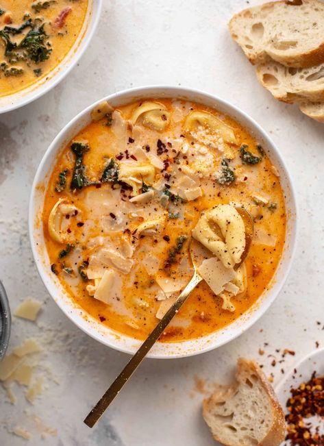 This fire roasted chicken tortellini soup is so easy and delicious. Fire roasted tomatoes and parmesan come together to create a savory rich broth, filled with tender chicken, kale and cheese tortellini. We love it! Fall Soup Dinner Recipes, Cozy Rainy Day Recipes, Summer Tortellini Soup, Fall Soup With Chicken, Carlsbad Cravings Soup, Early Fall Soup Recipes, Fire Roasted Chicken Tortellini Soup, Fire Roasted Chicken, Fire Roasted Tomato Soup 12 Tomatoes