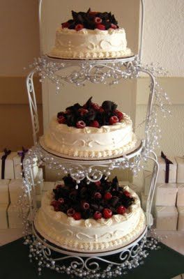 Cheesecakes - use a cream cheese frosting to decorate, then use chocolate shavings or drizzle, and have strawberries or raspberries. Cheesecake Wedding Cake Ideas Simple, Wedding Cheesecakes, Cheesecake Wedding, Raspberry Wedding, Cheesecake Wedding Cake, Wedding Cheesecake, White Chocolate Cheesecake, Wedding Cake Recipe, Chocolate Wedding Cake