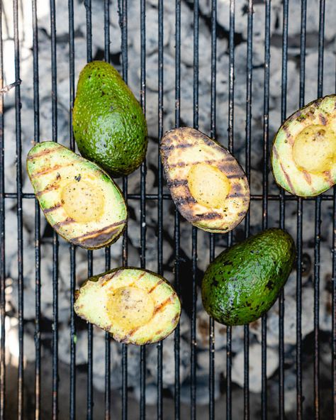 Grilled avocado is the trick you didn't know you needed! Top them with pico de gallo as a side, or use for smoky guacamole. Here's how to grill an avocado. #avocado #grilled #howto #summer #easy #sidedish #healthy Best Grilled Vegetables, Grilled Chicken Avocado, Avocado Recipes Easy, Roasted Tomato Salsa, Grilled Avocado, A Couple Cooks, Avocado Tomato Salad, Healthy Cook Books, Healthy Chicken Salad