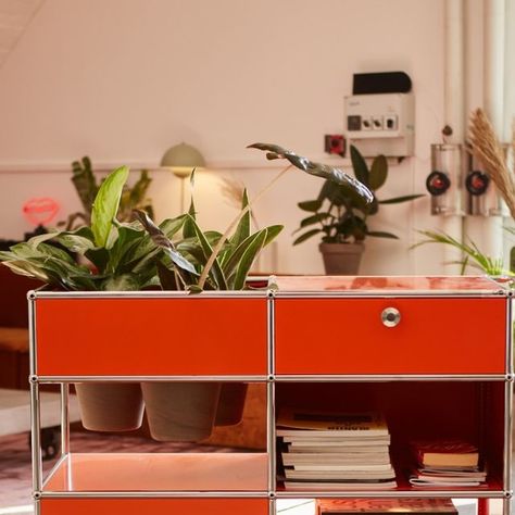 USM Modular Furniture on Instagram: "Getting ideas rolling with a burst of pure orange and a hint of greenery. This unit isn’t just storage, it’s a statement. Move it, style it, make it yours.

Which colour would you add to your space?

#USMfurniture #USMmodular #pureorange #workspacegoals" Usm Modular Furniture Living Rooms, Modular Sideboard, String Furniture Sideboard, Yellow Sideboard, Parker Knoll Sideboard, Eames Storage Unit, Move It, Modular Furniture, Sideboard