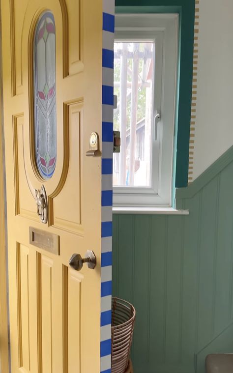 striped door trim yellow door Porch Tiles, Striped Door, Teal Interiors, Yellow Door, Yellow Doors, Mirror Mosaic, Door Trim, The Porch, Painted Doors