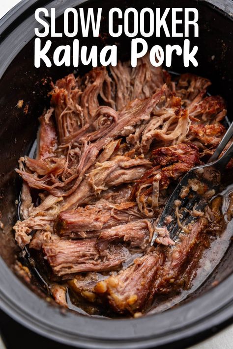 An overhead view looking into a slow cooker full of kalua pork. Crock Pot Kalua Pork, Kahlua Pork Slow Cooker, Kaula Pork Crockpot, Smoked Kalua Pork, Kalua Pig Crock Pot, Kalua Pork Crockpot Hawaiian, Kaluha Pork Recipes, Hawaiian Pork Crockpot, Kaula Pork